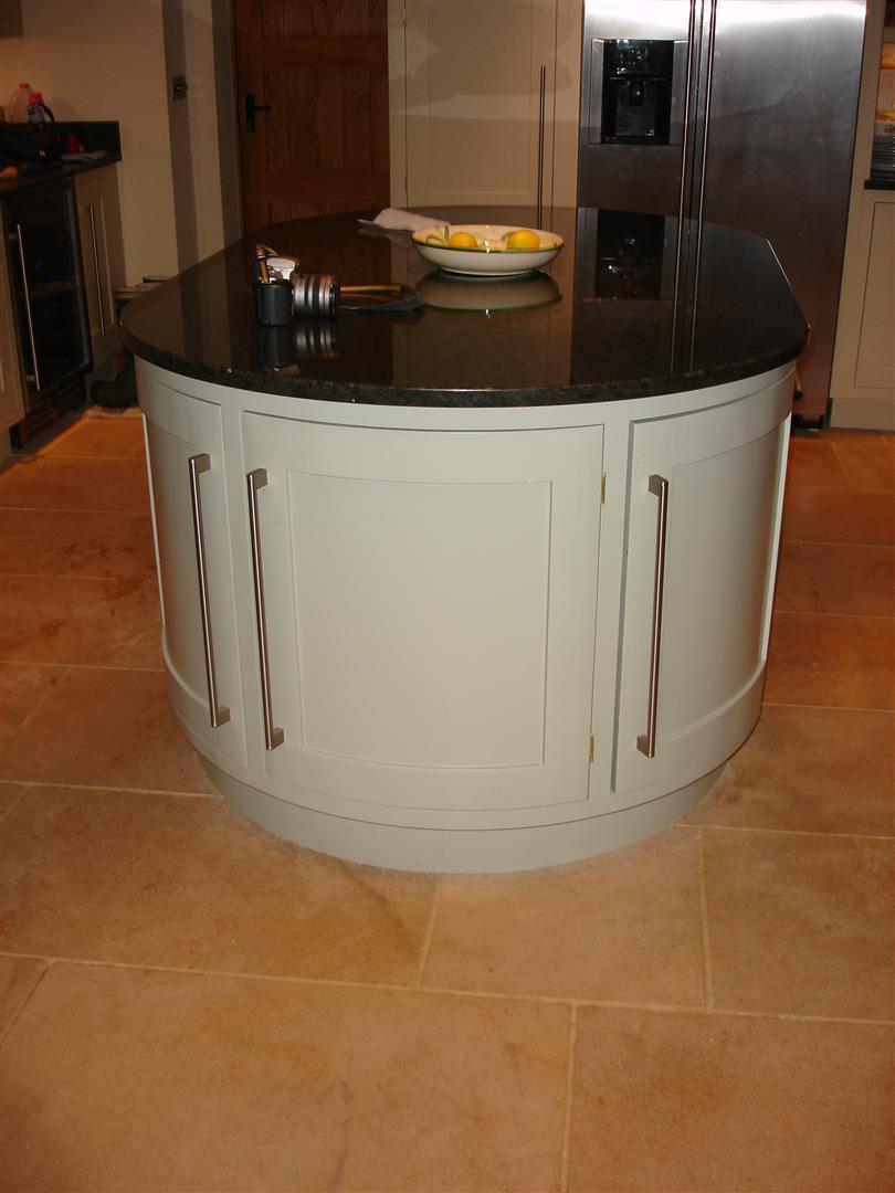 Redbrook kitchens design and install bespoke kitchens in Gloucestershire Rounded Kitchen island unit in Shaker design