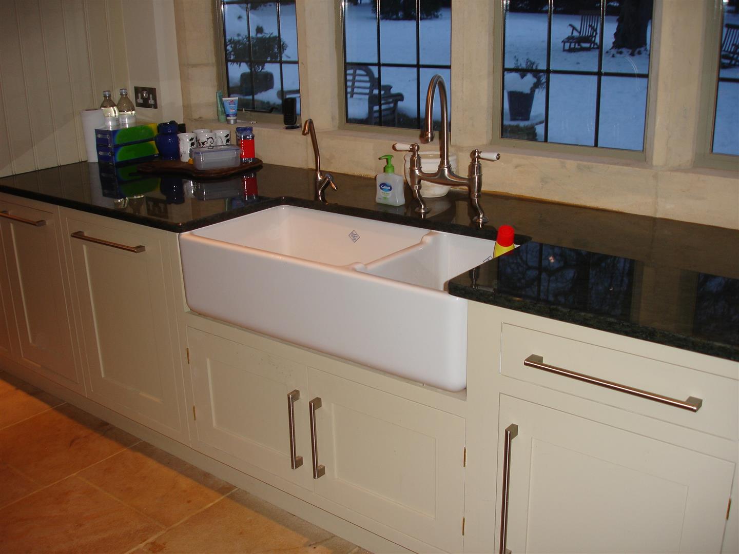 Redbrook kitchens design and install bespoke kitchens in Gloucestershire Plain fronte framed Shaker design with modern handles