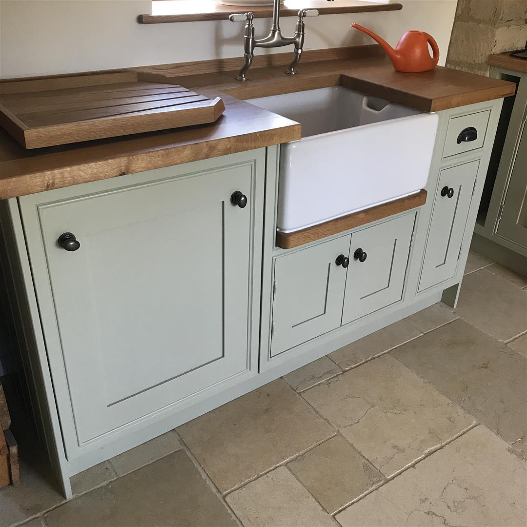 Redbrook kitchens design and install bespoke kitchens in Gloucestershire. Part of a large kitchen with a very traditional wet area