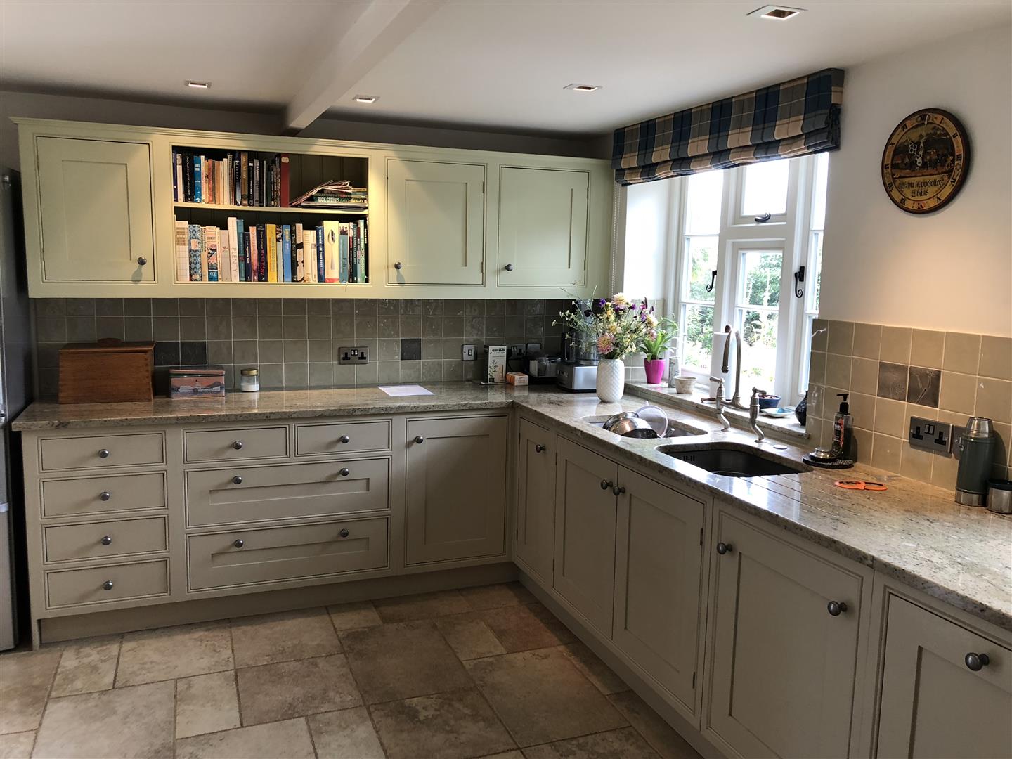 Redbrook kitchens design and install bespoke kitchens in Gloucestershire. Two tone kitchen with lovely granite tops