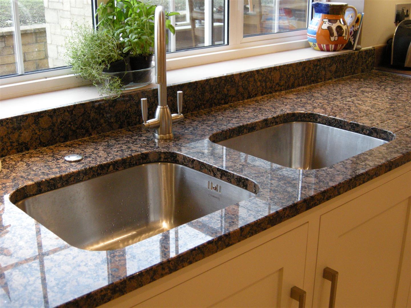 Redbrook kitchens design and install bespoke kitchens in Gloucestershire. Large underslung stainless steel sinks